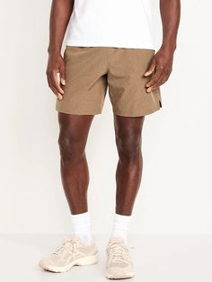 Essential Woven Workout Shorts -- 7-inch inseam | Old Navy Versatile Athletic Shorts With Pockets, Athleisure Swim Trunks With Pockets, Athleisure Stretch Swim Trunks With Pockets, Stretch Athleisure Swim Trunks With Pockets, Casual Stretch Swim Trunks With Pockets, Stretch Athletic Shorts With Pockets For Outdoor, Casual Brown Moisture-wicking Bottoms, Athleisure Solid Color Swim Trunks With Pockets, Casual Moisture-wicking Shorts For Travel