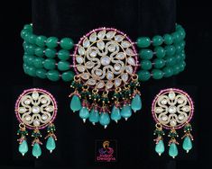 Beautiful and exclusive quality Rajasthani style beaded choker necklace with Gold plated American Diamond studded kundan pendant. Necklace comes with matching pair of earrings. This fine kundan choker necklace can have adjustable length with thread extension cord (dori) Gold Choker Designs, Bridal Necklace Gold, Kundan Choker Necklace, Kundan Choker Set, Faux Fur Handbag, Pink Choker, Gold Bridal Necklace, American Diamond Jewellery, Choker Designs