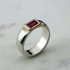 "Celebrate a special day - birthday, anniversary, Mother's day - or make a stunning addition to your collection with this band ring. This elegant piece flaunts a dainty Tourmaline stone. Elegant to wear solo or with other stacking rings to create your signature combinations. Product Details: *Ring width: 3.14\"/ 6mm *Stone Size: 3.5'*2.16\"/9*5.5mm *Ring Size: Please select from the drop-down menu. Why purchase this gold ring? Timeless and classy jewelry piece ✅ The ring is expertly handmade wit Unique Rectangular Anniversary Rings, Anniversary Birthstone Ring Rectangular, Anniversary Stackable Rings With Rectangular Shape, Rectangular Sapphire Birthstone Ring As Gift, Handmade Rings With Rectangular Stone For Anniversary, Stackable Rings With Rectangular Stone For Anniversary, Rectangular Ruby Ring For Anniversary, Handmade Anniversary Ring With Rectangular Stone, Anniversary Stackable Rings With Rectangular Stone