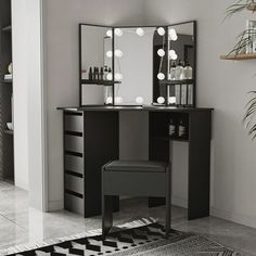 a dressing table with mirror, stool and lights