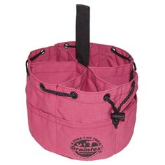 a pink bag with black handles and two zippers on the bottom, hanging from a hook