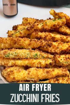 air fryer zucchini fries on a white plate