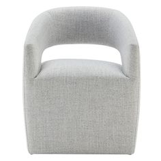 a grey chair on a white background with no one in the room to see it