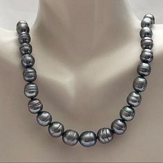 New Gray Baroque Cultured Pearl Necklace. 18 Inches. 5.5-9.5 Mm Gray Cultured Pearls. Individually Knotted Between Each Pearl. Sterling Silver Filigree Clasp. Stunning Color And Luster. Dress Up Or Down. Comes With Box. Smoke-Free Home. Not A Posh Member? Enter My Referral Code Dnsesq1 When You Join And Receive A $10 Credit. Blue Diamond Necklace, Wooden Bead Jewelry, Heart Pendant Necklace Gold, Bakelite Necklace, Crystal Stone Jewelry, Rose Gold Pendant Necklace, Diamond Choker Necklace, Resin Pendant Necklace, Sparkle Necklace