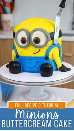 a minion cake sitting on top of a white plate with the words, full recipe and