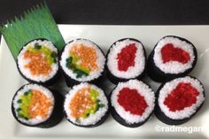 sushi - roll pom - poms on a plate with the words sushi - roll pom - poms