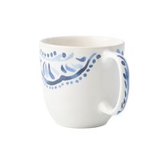 a blue and white coffee cup on a white background