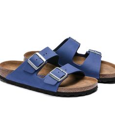 An Icon Of Timeless Design And Legendary Comfort, The Arizona Sandal Has Been Defining Style Since 1973. Nubuck Leather Elevates The Classic, Two-Strap Look With A Soft Yet Durable Feel. Featuring An Additional Foam Layer For Cushioning, The Soft Footbed Offers Extra Comfort Plus Go-All-Day Support. Cushioned Birkenstock Soft Footbed Creates Custom Support With Wear Nubuck Leather Upper Suede Footbed Lining Helps Keep You Comfortable Eva Sole Is Flexible And Lightweight Two Adjustable Straps Wit Comfortable Blue Leather Sandals, Blue Suede Sandals With Leather Footbed, Comfortable Blue Sandals With Leather Footbed, Blue Leather Sandals With Textured Footbed, Casual Blue Suede Sandals, Betula Sandals, Birkenstock Madrid Big Buckle, Birkenstock Sandals Women, Birkenstock Sandals Arizona