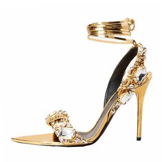 PRICES MAY VARY. Made of metallic patent leather, these gold heels for women are encrusted with sparkling crystals, which will add instant sparkle to any outfit. Sit atop a 4.72 inches high stiletto heel, get ready to show off your sassy side with these women’s stiletto high heel sandals. The insole is covered with smooth PU leather, with lightweight and slip-resistant rubber sole, these stilettos will allow you to take a comfy step outside. Highlights: Gold-tone, metallic sheen, decorative crys Curated Fashion, High Heels For Prom, Heels Prom, Rhinestone High Heels, Elegant High Heels, Jeweled Sandals, Strappy Stilettos, Open Toe High Heels, Metallic Sandals