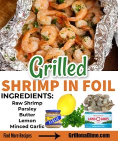 grilled shrimp in foil with lemons and parsley on the side for garnish