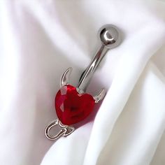 Super cute y2k 2000s silver diamond rhinestone red heart devil belly piercing ring bar.  Surgical steel  FREE STANDARD UK SHIPPING Silver Heart Belly Rings For Valentine's Day, Adjustable Body Jewelry For Valentine's Day, Valentine's Day Silver Heart Belly Rings, Silver Belly Rings For Valentine's Day, Y2k Heart-shaped Valentine's Day Jewelry, Valentine's Day Gift Silver Belly Rings, Valentine's Day Y2k Heart Jewelry, Valentine's Day Heart Shaped Y2k Jewelry, Valentine's Day Heart-shaped Y2k Jewelry