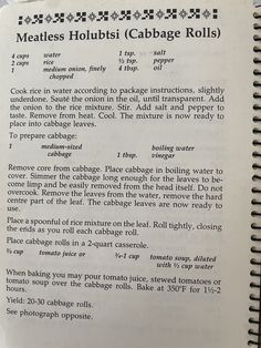 an open book with instructions on how to cook meatless houbisii cabbage rolls