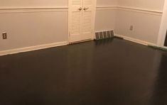 an empty room with hard wood flooring and white paint on the walls is shown