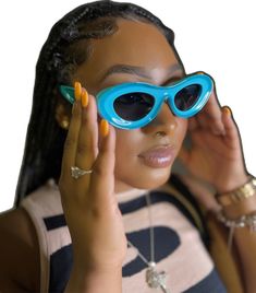 Fun Blue Sunglasses For Parties, Fun Blue Sunglasses For Party, Fun Blue Tinted Sunglasses, Blue Tinted Fun Sunglasses, Blue Fun Sunglasses With Tinted Lenses, Modern Blue Sunglasses With Uv Protection, Blue Retro Plastic Sunglasses, Retro Blue Plastic Sunglasses, Chic Blue Cat Eye Sunglasses