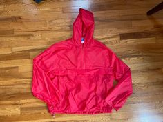 This is amazing. Would be a perfect throwback item in any collection/wardrobe. Also would be a great gift. Don't miss out on this one.  Condition is exactly as pictured.  Size medium.  Please make sure you know what you're ordering because there are no returns or cancellations. Thank you!! Sporty Red Windbreaker With Drawstring Hood, Red Sportswear Windbreaker For Fall, Red Athleisure Windbreaker For Outdoor Activities, Red Athleisure Windbreaker For Fall, Red Hooded Athleisure Windbreaker, Red Windbreaker For Spring Outdoor Activities, Red Windbreaker For Outdoor Activities In Spring, Red Spring Windbreaker For Outdoor Activities, Old School Workout