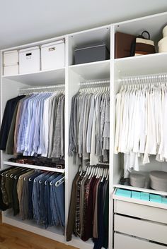 an organized closet with clothes and other items