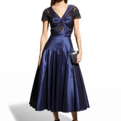 New With Tag. Night Blue. V Neckline. Short Sleeves. Hem Falls Below The Knee. Fit-And-Flare Silhouette. Polyester/Nylon/Spandex. Imported Model Is 5'10"/177cm. Fitted Taffeta V-neck Dress, Blue Taffeta Dress For Gala, Blue Full Skirt Dress For Party, Blue Taffeta Wedding Dress, Blue Full Skirt Party Dress, Blue Tea Length Dress For Evening, Blue Tea Length Evening Dress, Blue Tea-length Dress For Evening, Blue Silk Evening Dress With Pleated Bodice