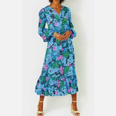 Nwt Lilly Pulitzer Loubella Smocked Midi Dress In Multi Soiree All Day, Size 10 Easy Fit Midi Dress With A Button Front Placket, Smocked Waistband, And Long Sleeves With Tall Smocked Cuffs. 52" From Top Of Shoulder To Hem, From Armpit To Armpit 19" Skims The Body. Roomier Fit. Viscose Satin (100% Rayon). Dry Clean. Blue Beach Dresses With Smocked Cuffs, Blue Dresses With Smocked Cuffs For The Beach, Blue Vacation Dress With Smocked Cuffs, Blue Midi Dress With Smocked Cuffs, Blue Vacation Dresses With Smocked Cuffs, Blue Smocked Dress For Garden Party, Blue Dress With Smocked Cuffs For Brunch, Spring Blue Midi Dress With Smocked Cuffs, Blue Dress With Smocked Cuffs For Garden Party