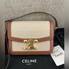 Celine's Triomphe Teen Bag Elegantly Marries Textile And Calfskin, Exuding Timeless Sophistication. Its Triumph Metal Clasp Adds A Distinctive Flair, While The Lambskin Lining Envelops Your Essentials In Luxury. With Versatile Carrying Options And Thoughtfully Designed Compartments, This Bag Is The Perfect Companion For The Modern, Stylish Individual On The Go. Celine Triomphe, Bags For Teens, Celine Bags, The Go, The Modern, Calf Skin, Bag Lady, Color