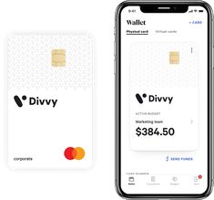 a phone and a credit card with the word divy on it, sitting next to each other