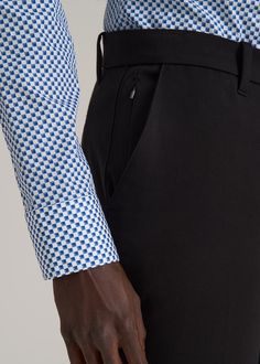 About Our Stretch Dress Pants for Tall Men Searching for slacks for tall men is challenging, and finding ones that are actually comfortable is even harder. That’s why we made these men’s tall pants with a unique stretch twill. A touch of flex gives all day comfort while the twill offers a classic finish. Equally polished and easy to wear, these pants are designed specifically for men from 6’3 to 7’1. We wanted to create an elevated basic for tall guys that can be worn to work, dinner or upscale Black Business Dress Pants With Welt Pockets, Black Dress Pants With Welt Pockets For Business, Black Semi-formal Dress Pants With Welt Pockets, Black Tailored Bottoms With Straight Hem, Semi-formal Black Work Pants With Welt Pockets, Black Semi-formal Work Pants With Welt Pockets, Black Straight Hem Pants For Office, Black Semi-formal Bottoms With Straight Hem, Formal Black Work Pants With Straight Hem