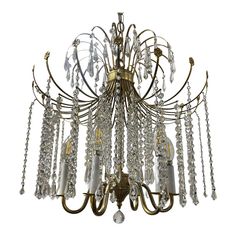 a chandelier with many crystal beads hanging from it