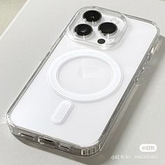 an iphone case with two buttons on the front and one button on the back, sitting on a white surface