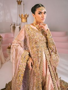 Peach Pink Bridal Lehenga Pakistani Wedding Dresses are adorned with dabka, Resham, and tilla details. The Pishwas Dress is available Online. Custom sizes. Pink Bridal Lehenga Pakistani, Bridal Pishwas, Rose Quartz Palette, Bridal Lehenga Pakistani, Lehenga Pakistani, Pink Bridal Lehenga, Pakistani Lehenga, Tissue Fabric, Pakistani Bridal Dress