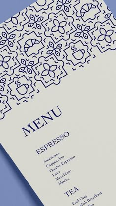 a menu designed to look like an intricate pattern with the word menu printed on it