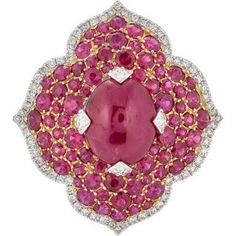 Imagine the feeling of pure luxury and elegance as you slip on the Pacha Ring in Ruby by Piranesi. With a stunning 3.71 carat cabochon ruby as the centerpiece, this ring exudes timeless beauty and sophistication. Surrounding the ruby are 2.91 carats of round rubies that complement the rich red color of the cabochon. To add a touch of sparkle and glamour, the ring is also adorned with 0.77 carats of round diamonds. The 18K white and rose gold setting enhances the natural beauty of the stones, cre Luxury Ruby And Diamond Oval Cabochon Ring, Luxury Ruby Ring With Oval Cabochon Diamond, Luxury Ruby Cabochon Diamond Ring, Luxury Oval Cabochon Ruby Ring, Luxury Ruby Ring With Oval Cabochon And Polished Finish, Luxury Ruby Ring Oval Cabochon With Polished Finish, Luxury Ruby Ring With Cabochon Cut, Luxury Ruby Ring Oval Cabochon Polished Finish, Luxury Ruby Ring With Oval Cabochon