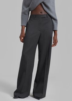 Color: Grey Melange Wool melange twill fabric Relaxed fit Wide leg Mid rise Travelers crease Adjustable waist with buttons Slant hip pockets Back welt pockets Belt loops Zip fly Hook and bar closure Unlined 100% Virgin Wool Professional Dry Clean Only By Róhe. Made in Lithuania Pocket Belt, Twill Fabric, Lithuania, Wide Leg Trousers, Welt Pockets, Welt Pocket, Mid Rise, Wide Leg, Dry Clean