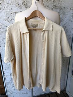 "Cotton Ginny Plus Pale Yellow Shirt Sleeve Sweater 100% Cotton Collared Button up Size medium Measurements taken while laying flat Neck 5\" Pit to Pit 25\" Sleeves from pit to edge 3\" Length from shoulder to bottom 25\" Purchase price includes free shipping in Canada and the USA International shipping is available, please contact before purchase for shipping quote Any questions, just ask! Vintage item, regular wear due to age should be expected  Any known flaws/ markings will be listed No returns/ exchanges, but please contact if there is an issue with your item" Yellow Short, Yellow Shirt, Yellow Shirts, Short Sleeve Sweater, Yellow Shorts, Short Sleeved Sweaters, Pale Yellow, Sleeve Sweater, Cardigans For Women