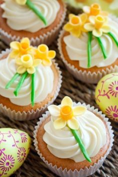 easter cupcakes decorated with icing and flowers