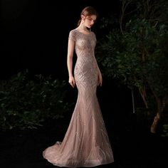 Backless Mermaid Dress With Sweep Train, Elegant Backless Mermaid Evening Dress, Embellished Fitted Mermaid Dress For Prom, Backless Mermaid Evening Dress For Prom, Gala Evening Gown With Mermaid Hem, Elegant Backless Bridesmaid Dress For Prom Season, Backless Bridesmaid Dress For Prom, Maxi Length Evening Dress For Gala And Prom Season, Glamorous Backless Dress With Sweep Train