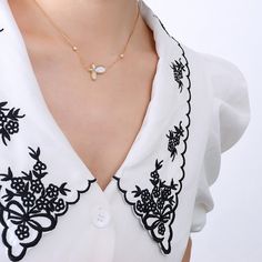 Style: Female Material: Titanium Steel, Mother of Pearl/Seashell Pearl Type: Cultured Pearl Color: White Necklace Length: 40+5cm Pendant: 1.8*1.35cm Elegant Clavicle Chain Charm Necklaces For Beach, White Shell Necklace With Clavicle Chain, Elegant Gold Charm Necklace For Summer, Elegant Summer Charm Necklaces As Gifts, Elegant Summer Charm Necklaces For Gifts, Elegant Summer Charm Necklaces, Elegant Summer Charm Necklace As Gift, Elegant Summer Charm Necklace For Gift, Summer Clavicle Chain Pendant Necklace