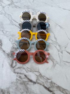 Personalized toddler sunglasses for all the little sprouts in your life. Great for gifts of all kinds, sure to make your kid smile. Let me create the perfect pair for you. Fun Handmade Sunglasses As A Gift, Cute Customizable Sunglasses For Gift, Playful White Sunglasses For Gift, Playful White Sunglasses For Gifts, Playful White Sunglasses As Gift, White Cute Sunglasses For Birthday, Fun Sunglasses With Uv Protection For Birthday, Fun Sunglasses With Tinted Lenses For Birthday, Fun Sunglasses With Uv Protection For Gift