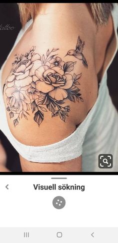 a woman's shoulder with flowers on it and the words visual skining written below