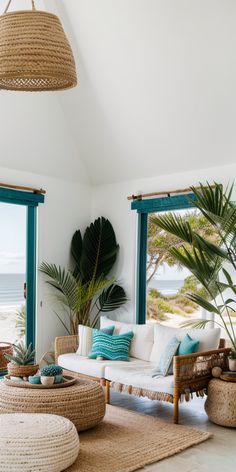 a living room filled with furniture and plants