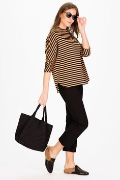 Meet the Betsy! This will be your go-to top all season long. Made from the softest and stretchiest fabric, this relaxed-fit top makes dressing a breeze! Pair it with our traveling pants for the perfect fall outfit! FEEL: (45% Rayon 50% polyester 5% spandex) This sumptuously soft Fall Stripe is crafted for comfort and style. This fabric boasts a timeless stripe pattern that not only feels incredibly soft but also exudes a classic charm perfect for the fall season. FAVORITE FEATURES: Raw hems Soft Oversized Textured Knit Tops For Work, Oversized Casual Knit Top For Work, Chic Black Relaxed Fit Knit Top, Relaxed Fit Knit Top For Everyday Fall Wear, Chic Stretch Knit Top For Everyday, Relaxed Fit Knit Top For Workwear In Fall, Relaxed Knit Tops For Fall, Effortless Fall Blouse For Day Out, Effortless Fall Day Out Blouse