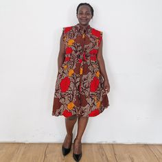 Our loose fit colourful dresses made out of non-stretchy African print are perfect for you in case you are looking for a style idea that is versatile, comfortable, and looks fabulous year-round. All materials used to design the dresses are sourced in Kenya.  MEASUREMENT GUIDE:  We recommend asking questions about sizes or you can take your own measurements (at the bust) if unsafe. Since its an A- Line, you only need to ensure that you have the right fit for the bust. Please see our measurement g Casual Sleeveless Midi Dress With Vibrant Print, Sleeveless Printed Brown Maxi Dress, Brown Sleeveless Printed Maxi Dress, Red Printed Sleeveless Midi Dress, Sleeveless Printed Red Midi Dress, Sleeveless Red Printed Midi Dress, Red Sleeveless Printed Midi Dress, Sleeveless Printed Dress For Casual Wear, Casual Printed Sleeveless Dress