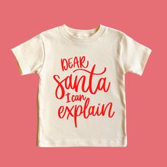 Dear Santa I can Explain Christmas Shirt Feature Picture is Natural Tee with Red Design Wash: For best results wash inside out on cold and line dry. DO NOT IRON directly on the image All our designs are printed with high quality heat transfer vinyl. The designs are applied using a professional commercial grade heat press and are made to last. All items are made to order in the order in which they are received so please allow 5 business days for your order to be shipped out. Business days include Dear Santa Toddler Shirt, Shirts To Make, Spreading Christmas Cheer, Toddler Christmas Shirt, Dear Santa I Can Explain, Santa I Can Explain, I Can Explain, Sweet Grace, Halloween Adventure