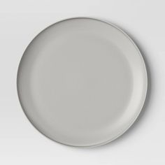 an empty white plate on a white background