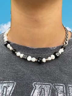 The 'MAGIC 8' half & half necklace is what you've been waiting for - from the freshwater pearls and lamp work charms to its stainless steel chain, this necklace is bound to make a statement. Pair the 'MAGIC 8' on its own or stack with 549's classic half & half pearl necklace to dress up any outfit! Made with freshwater pearls and black lamp work charms - magic 8 ball, dice, and mushroom. Stainless steel chain. Waterproof and rust-free. Available in lengths 14", 15", 16', 18", 20". All lengths co Man Beads Necklace, Cool Pearl Necklace, Man Beaded Necklace, 8 Ball Necklace, Handmade Jewelry For Men, Men’s Pearl Necklace, 8ball Necklace, Necklace Men Diy, Cool Necklaces For Men