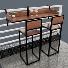 a table with two chairs and a wine bottle on it