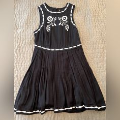 Free People Embroidered Sundress Color: Black And White Size 4 I Have Had This For A While But I Have Never Worn It, So Like New Without Tags! Dress Is Lined! Black Embroidered Beach Dress For Spring, Spring Beach Black Embroidered Dress, Black Fitted Cotton Embroidered Dress, Fitted Black Cotton Embroidered Dress, Spring Beach Embroidered Black Dress, Fitted Cotton Embroidered Black Dress, Black Embroidered Cotton Dresses, Black Cotton Dress With Embroidery, Black Embroidered Mini Dress For Summer