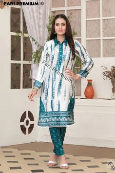 Last Dress in Large 46" Bust Round   Free Shipping  BRAND NEW Stitched, Ready-Made Embellished, Tie & Dye Printed  2-Piece Silk Shalwar Kameez 2 Piece Suit  READY-MADE / STITCHED / READY TO WEAR Two Piece Includes: 1. Shirt: Full-sleeve silk kameez/shirt with printed tie & dye design on front. Shirt has a beautiful collar neck open design halfway down with pearl & stone buttons and a lace designed on bottom half. White Hoop Lace designed on front and back of daaman and sleeve cuffs. 2. Shalwar/Bottom: Silk Shalwar with a full tie & dye design print on entire shalwar. Color(s): Ocean-Blue, White Clothing Type(s): Kurti/Kameez, Shalwar/Trouser Available in Size:  👗 Large 46 Bust-Round Measurements: Large 46" Size Shirt/Kameez:  ✮ Bust-Round: 46.5" ✮ Waist-Round: 44.5" ✮ Hip-Round: 50" ✮ Len Long Sleeve Salwar Kameez With Bandhani Print, Long Sleeve Bandhani Print Salwar Kameez, Designer Bandhani Print Kurta For Eid, Unstitched Bollywood Kurta With Printed Motifs, Long Sleeve Churidar With Bandhani Print For Eid, Long Sleeve Bandhani Print Churidar For Eid, Eid Bandhani Print Salwar Kameez With Straight Kurta, Cambric Salwar Kameez With Pallu For Eid, Long Sleeve Cambric Kurta With Printed Motifs