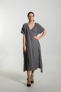 Linen dress, loose fitting, oversized linen dress, ankle length . Loose wrap linen dress with side splits. Model is 175 cm 59 tall, 60kg / 132 lb and wear size L, color grey Can be worn as a dress and with pants as a overdress . Made from 100% stone washed French linen Please choose the Casual Cotton V-neck Wrap Dress, Relaxed Fit V-neck Linen Dress With Pockets, Relaxed Fit V-neck Midi Dress For Loungewear, Everyday Short Sleeve Relaxed Fit Dresses, Relaxed Fit Midi Dress With Rolled Sleeves, Casual V-neck Dress For Everyday, Casual V-neck Cotton Wrap Dress, V-neck Relaxed Fit Everyday Dresses, Relaxed Fit V-neck Everyday Dress