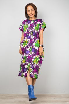 "Purple Ankara dress | African Print shirt Dress | holiday resort dress | Women's summer cotton dress  This women's dress is from a quality Ankara cotton and has very tidy sewing and is made with the highest care.   Original Design and produced by NUICHAN     PRODUCT SIZE : One Size Fits Most *Chest : up to 42\" *Sleeve length : 9\" (from neckline to hem) *Waist : up to 40\"   *Hips : up to 42\" *Length : 43\" from shoulder to hem NOTE :  * Model chest : 32\", waist : 24\" hips : 35\"  * Combine Cotton Short Sleeve Shirt Dress For Vacation, Cotton Knee-length Shirt Dress For Vacation, Knee-length Cotton Shirt Dress For Vacation, Summer Midi Dress With Short Sleeves And Print, Printed Short Sleeve Shirt Dress For Beach, Beach Cotton Shirt Dress With Short Sleeves, Short Sleeve Cotton Shirt Dress For Beach, Beach Short Sleeve Cotton Shirt Dress, Short Sleeve Maxi Dress With Vibrant Print For Vacation