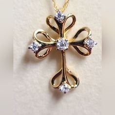 Moissanite Fire .37ctw Diamond Equivalent Weight Round, 14k Yellow Gold Over Sterling Sliver Cross Pendant With 18 Inch Rope Chain. Measures 1 & 1/16" L X 13/16" W. Actual Moissanite Weight Is .31ctw. New In Box. Selling Late Mother-N-Law's Items. Feel Free To Make Offers Hallmarked Gold Moissanite Jewelry, Diamond Cross Jewelry For Anniversary, Moissanite Yellow Gold Jewelry For Anniversary, Anniversary Moissanite Yellow Gold Jewelry, Yellow Gold Moissanite Jewelry For Anniversary, Anniversary Yellow Gold Moissanite Jewelry, 14k Gold Cross Diamond Necklace For Anniversary, Anniversary Jewelry With Diamond Accents On Cross Pendant, Sterling Silver Cross Pendant Diamond Necklace For Anniversary