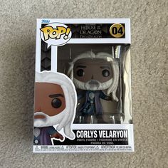 an image of a pop vinyl figure from the game of thrones with white hair and beard